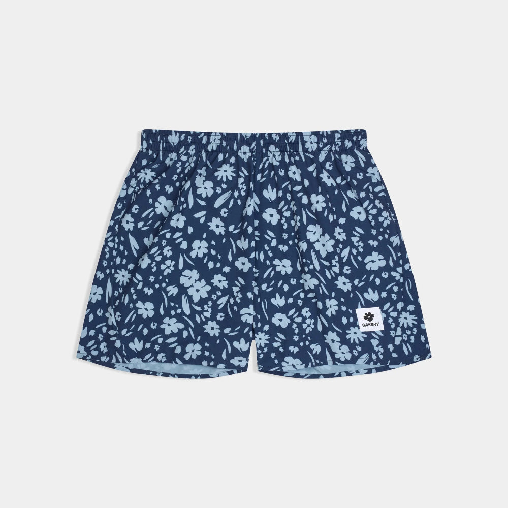 Navy blue shorts with light blue floral pattern on a white background