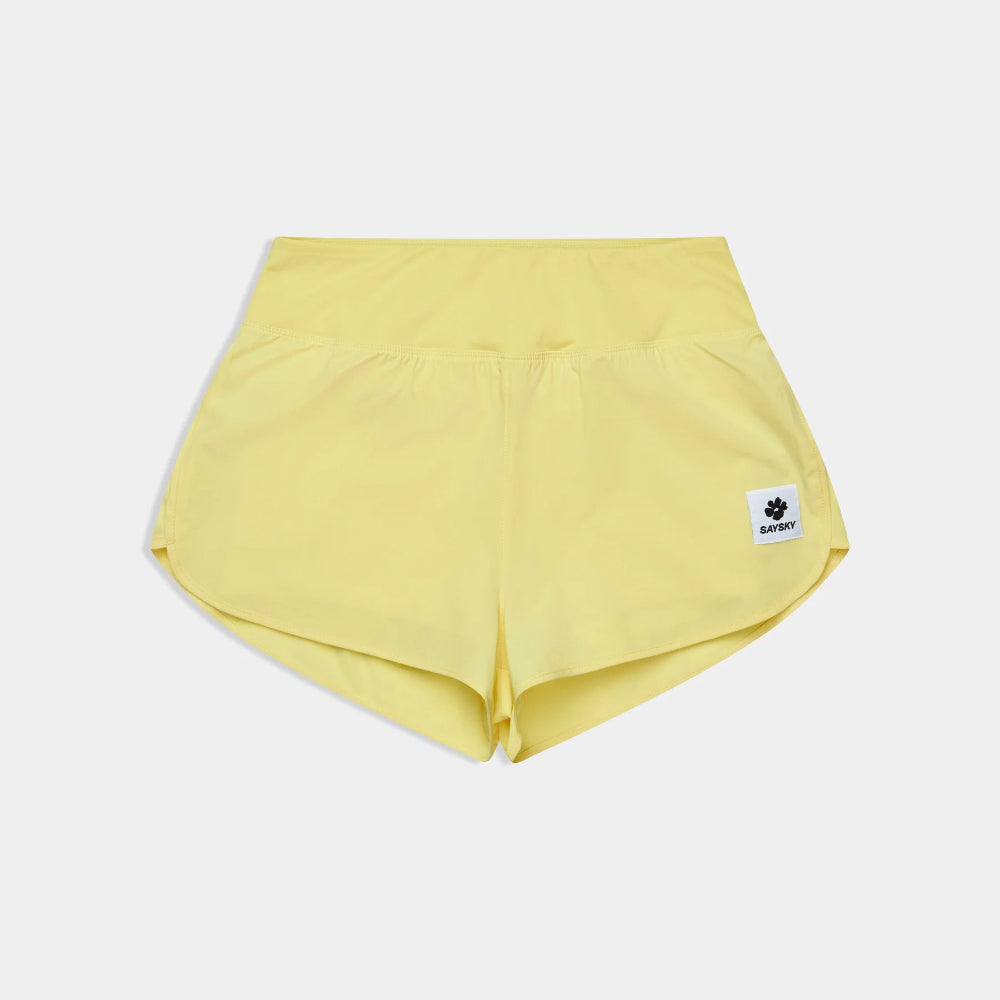 Yellow shorts with a small logo on a light gray background