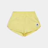 Yellow shorts with a small logo on a light gray background