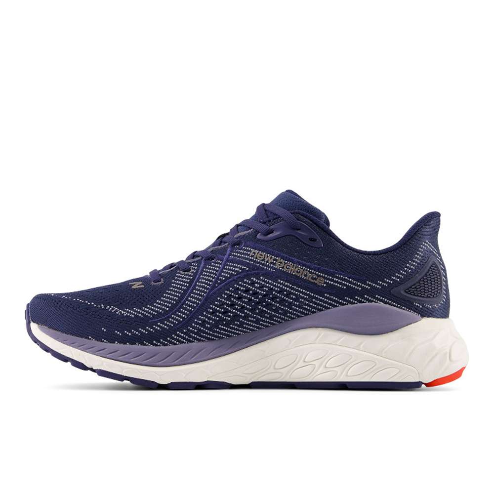New Balance 860 v13 Herre - Navy/ Ginger Lemon set fra siden