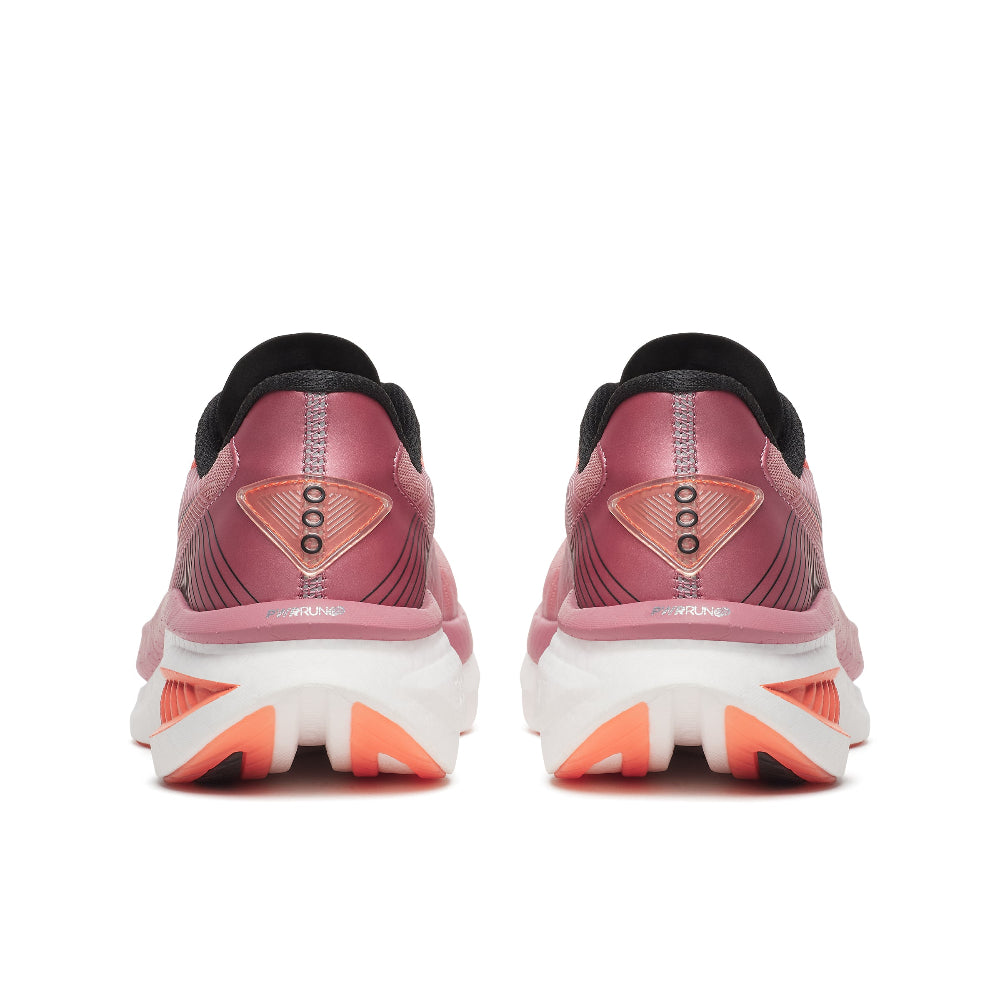 Pink running shoes with white sole on a white background