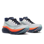 Pair of running shoes with orange and blue accents on a white background