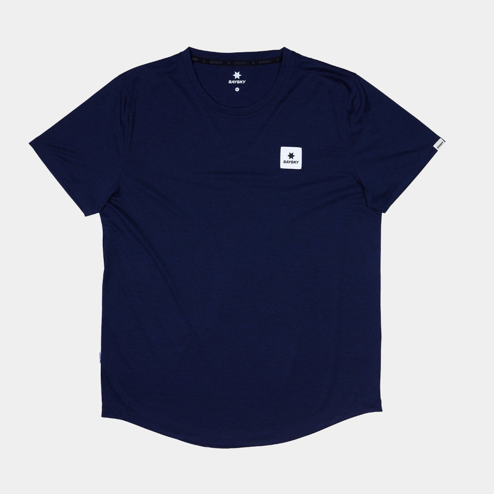 Navy blue t-shirt with a small white logo on a light gray background