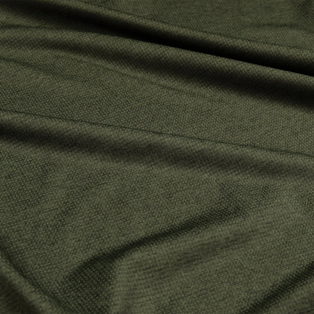 Close-up of dark green fabric with visible texture