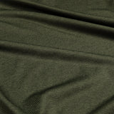 Close-up of dark green fabric with visible texture