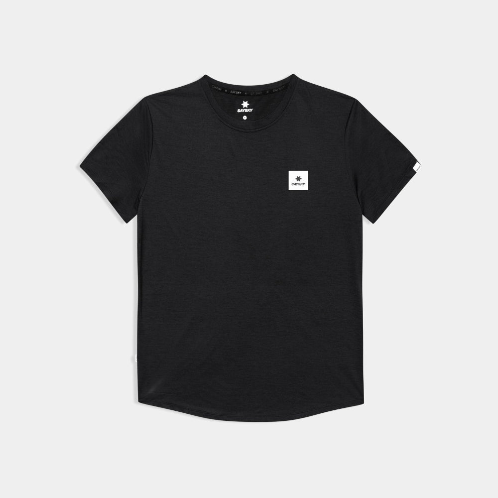 Black t-shirt with a small logo on a light gray background
