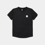 Black t-shirt with a small logo on a light gray background