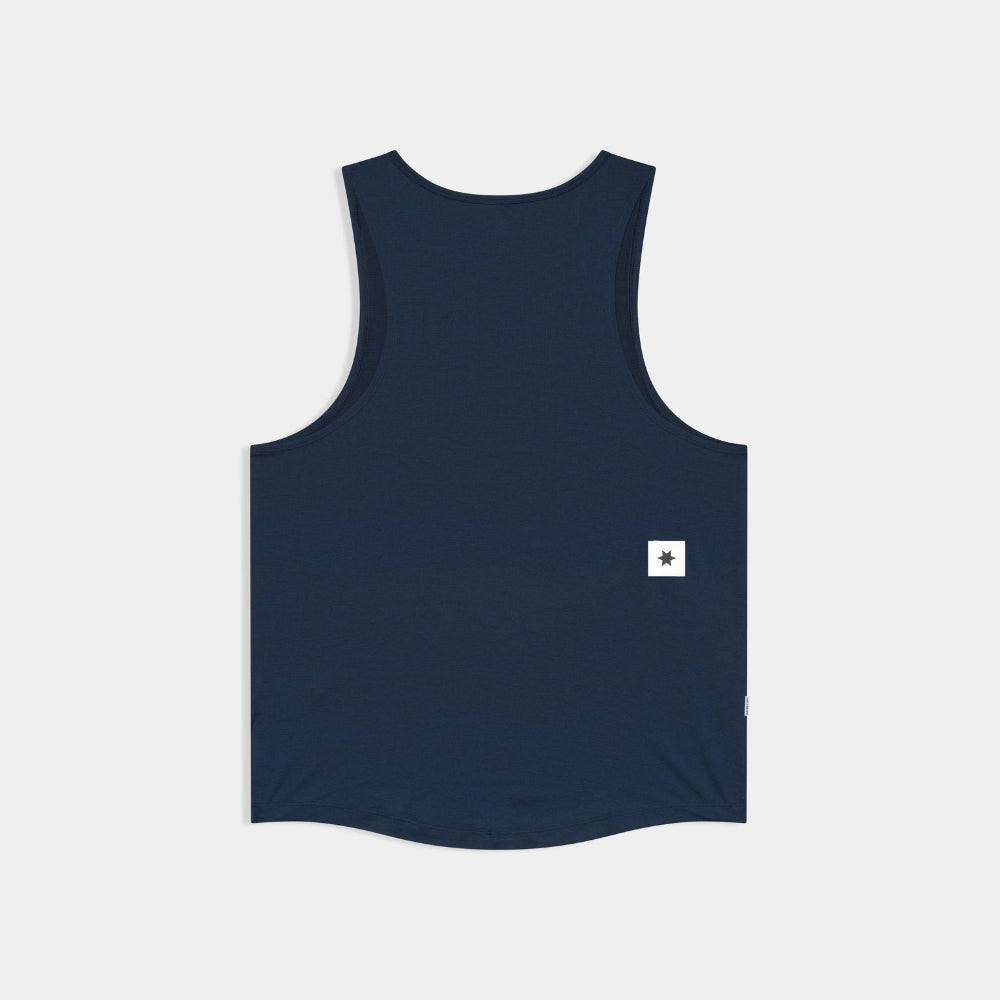 Navy blue tank top with a small white logo on the back against a light gray background