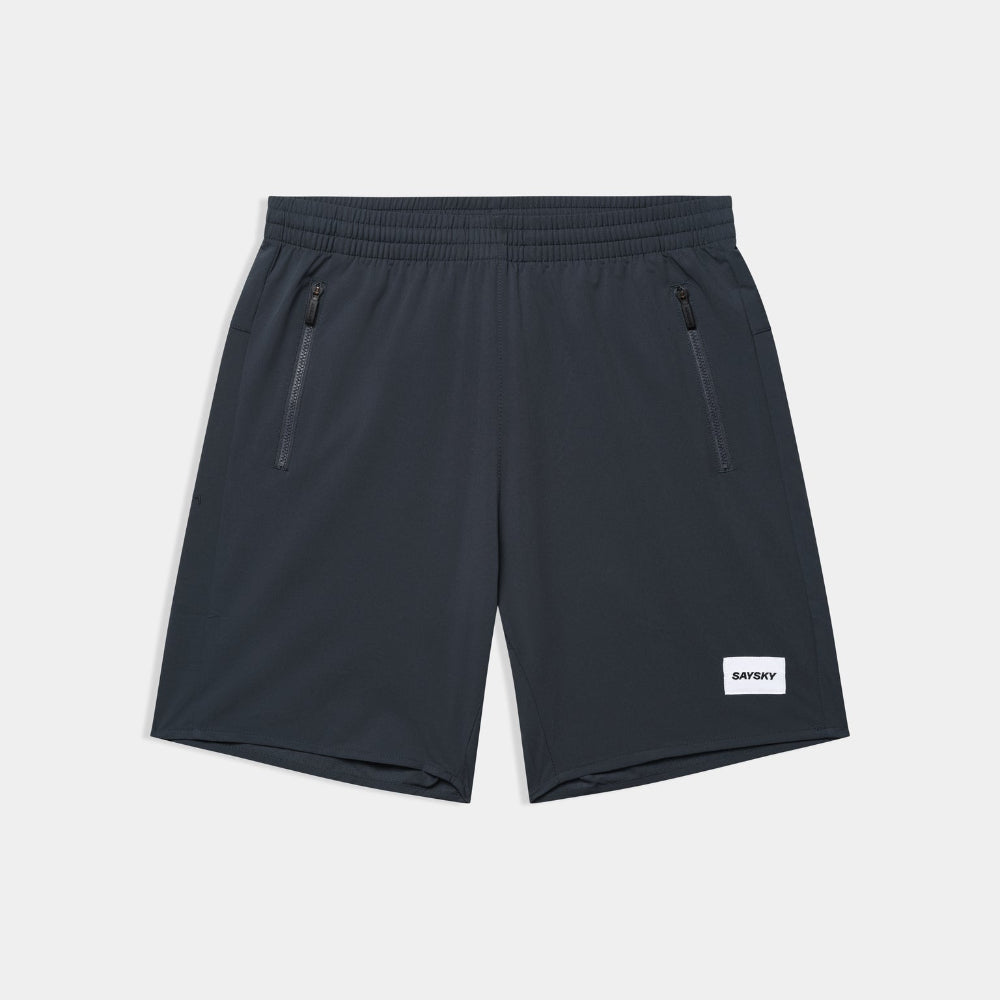 Black shorts with a brand label on a light gray background