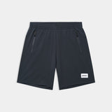 Black shorts with a brand label on a light gray background