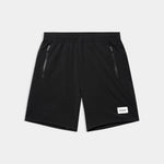 Black shorts with zippers on a light gray background