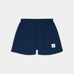 Navy blue shorts with a brand logo on a light gray background