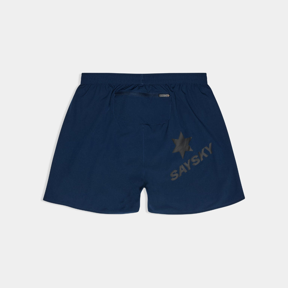 Navy blue shorts with a logo on a light gray background