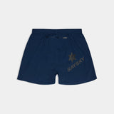 Navy blue shorts with a logo on a light gray background
