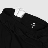 Black pants with a visible brand logo on a white background