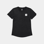Black t-shirt with a small white logo on a light gray background