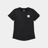 Black t-shirt with a small white logo on a light gray background