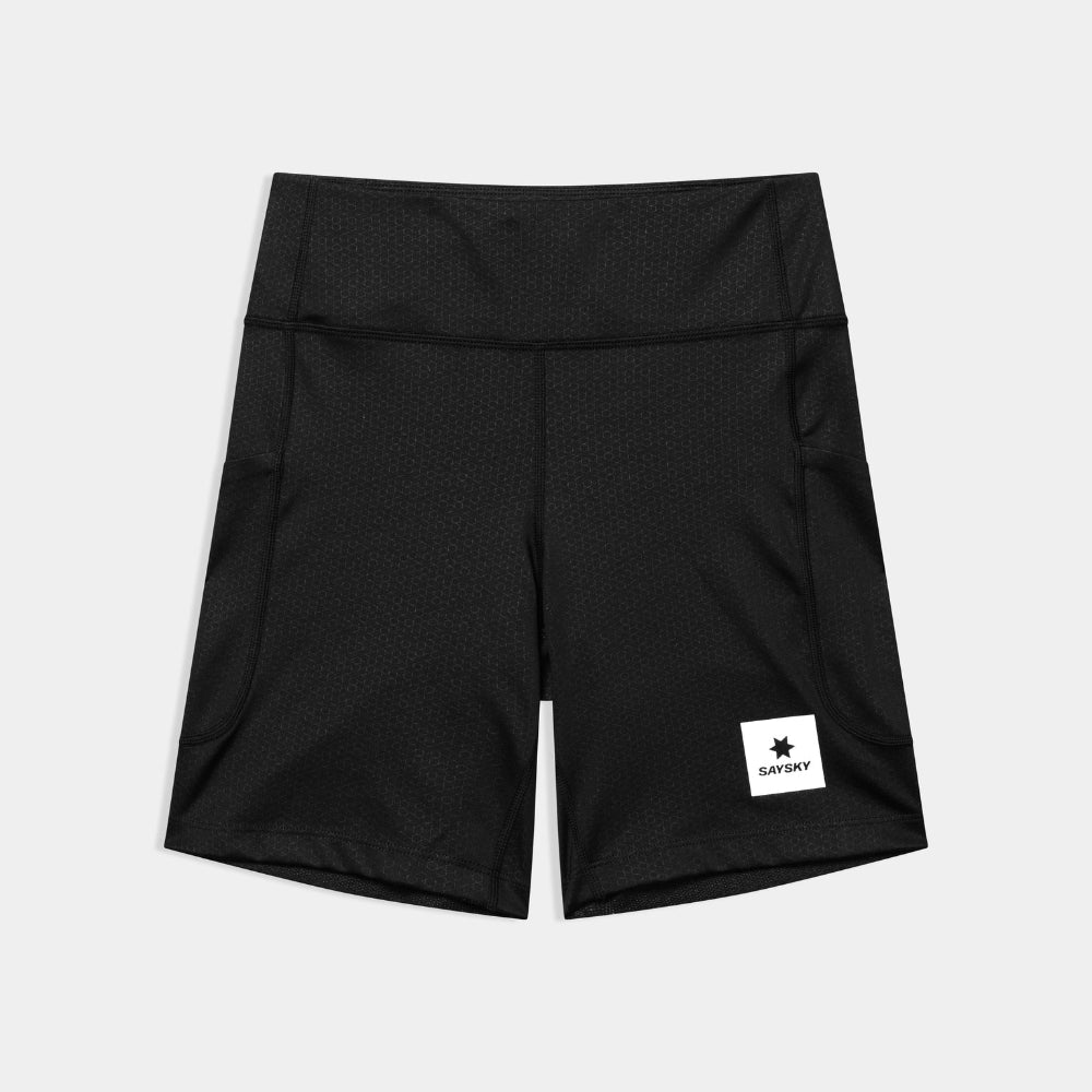 Black shorts with a visible brand label on a light gray background
