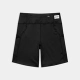 Black shorts with a brand label on a light gray background